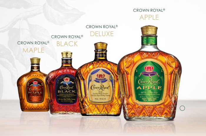 Crown royal regal apple ™ flavored whisky in a cocktail shaker with ice. 